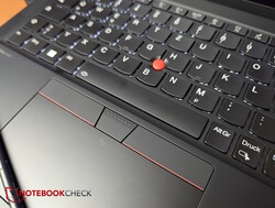 Het touchpad en het trackpoint met speciale knoppen